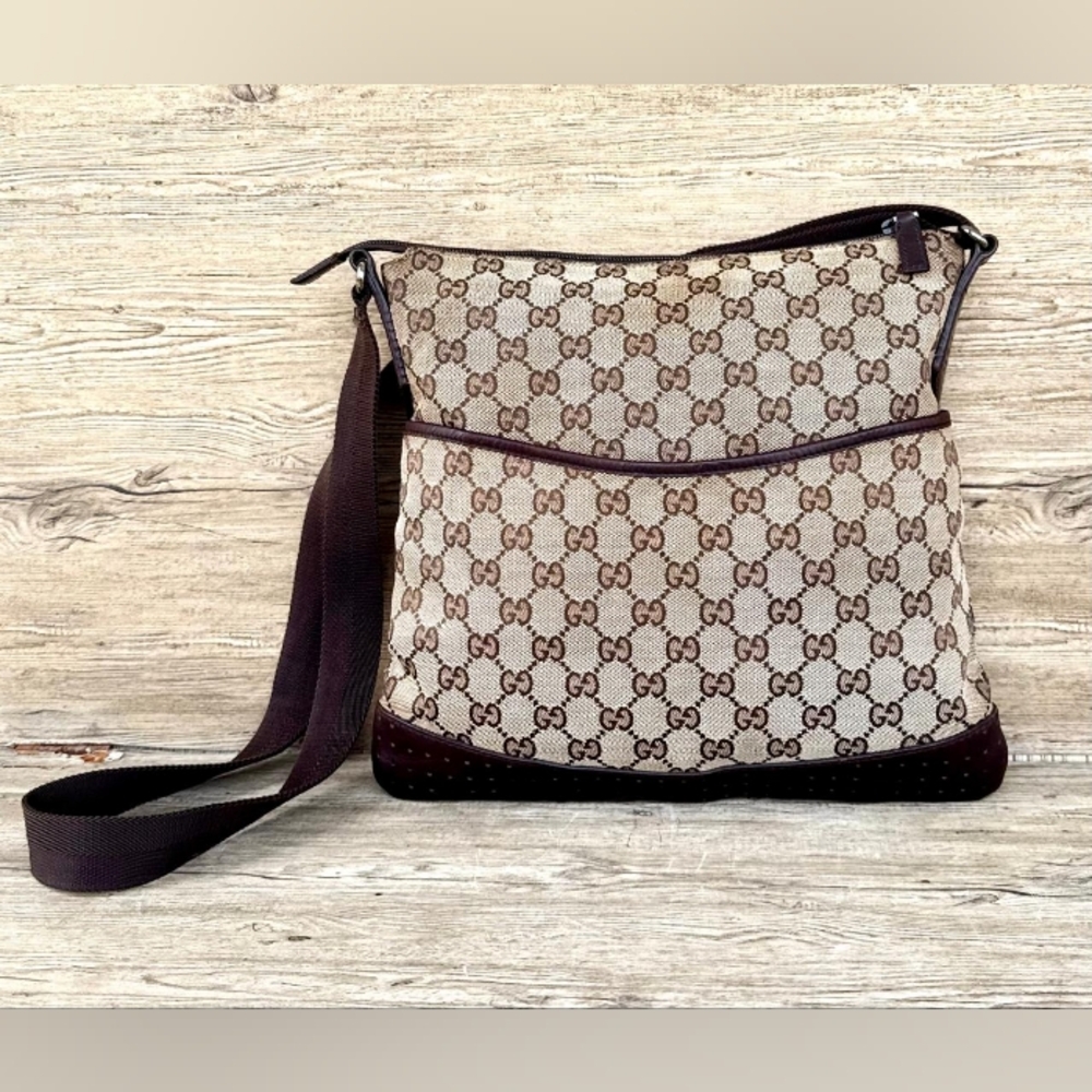 Gucci GG Monogram perforated leather messenger bag